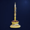Roue du Dharma dorée ou Dharmachakra aux détails précieux et dorés | OkO-OKO™ Close-up side view of a golden roue dharma doree dharmachakra featuring intricate red and blue enamel engraved details