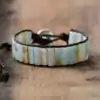 Lithotherapie Sieraad Armband met natuurlijke Amazonietsteen. | OkO-OKO™ Zwarte Amazoniet armband op tafel | oko oko