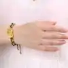 Joyería Espiritual Pulsera Perro de Fô. | OkO-OKO™ Pulsera de cristal amarillo natural que se lleva en la muñeca. oko oko