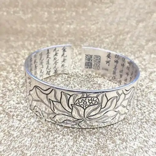 Lotus Sutra bracelet on a table | OkO