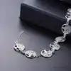 Bijou Spirituel <br> Bracelet Arbre de vie. | OkO-OKO™ Bracelet Arbre de vie posé sur table | oko oko