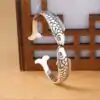 Spiritueller Schmuck Doppelter Fisch-Armband. | OkO-OKO™ Armband Fisch Silber von vorne gesehen | OkO-OkO