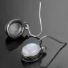Bijou Lithothérapie <br> Boucles d'Oreilles pierre de lune. | OkO-OKO™ Boucle d'oreille pierre de lune une posé à plat | oko oko