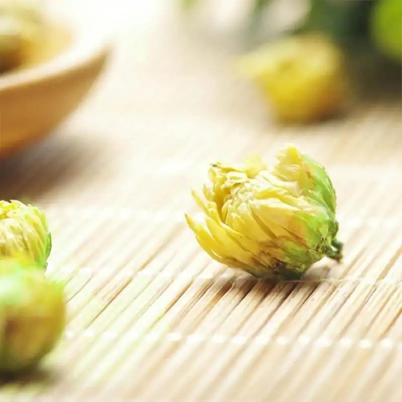 Tea and Infusion <br>Organic Chrysanthemum Tea. | OkO-OKO™ Organic Chrysanthemum tea on the table | oko-oko