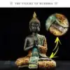 Sitting Buddha statue with green scarf | oko oko