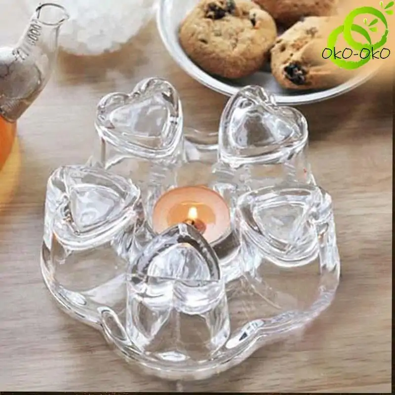 Chauffe Théière <br> En Verre (Borosilicate). | OkO-OKO™ Chauffe Théière en Verre posé sur une table | okooko