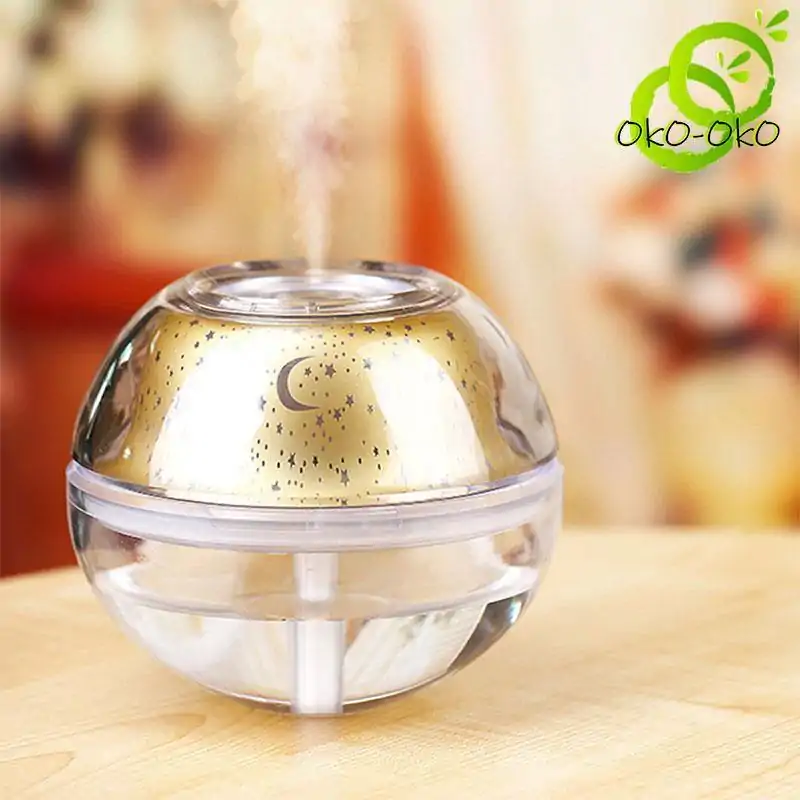 Diffuseur d'huile essentielle <br>pluie d'étoile. | OkO-OKO™ Diffuseur d'Huile Essentielle Pluie D'Étoile posé sur table | oko oko