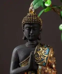 Statue Bouddha Assis détail du visage | oko oko