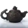 Dragon teapot on white background | OkO-OkO