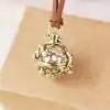 Bijou Diffuseur Huiles Essentielles <br> Boule en laiton (10 variantes). | OkO-OKO™ Pendentif diffuseur d'huiles essentielles boule en laiton fleur | oko oko