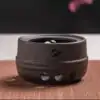 Chauffe Théière <br> Japonais en céramique. | OkO-OKO™ Chauffe Théière en Céramique posé sur une table | OkO-OkO
