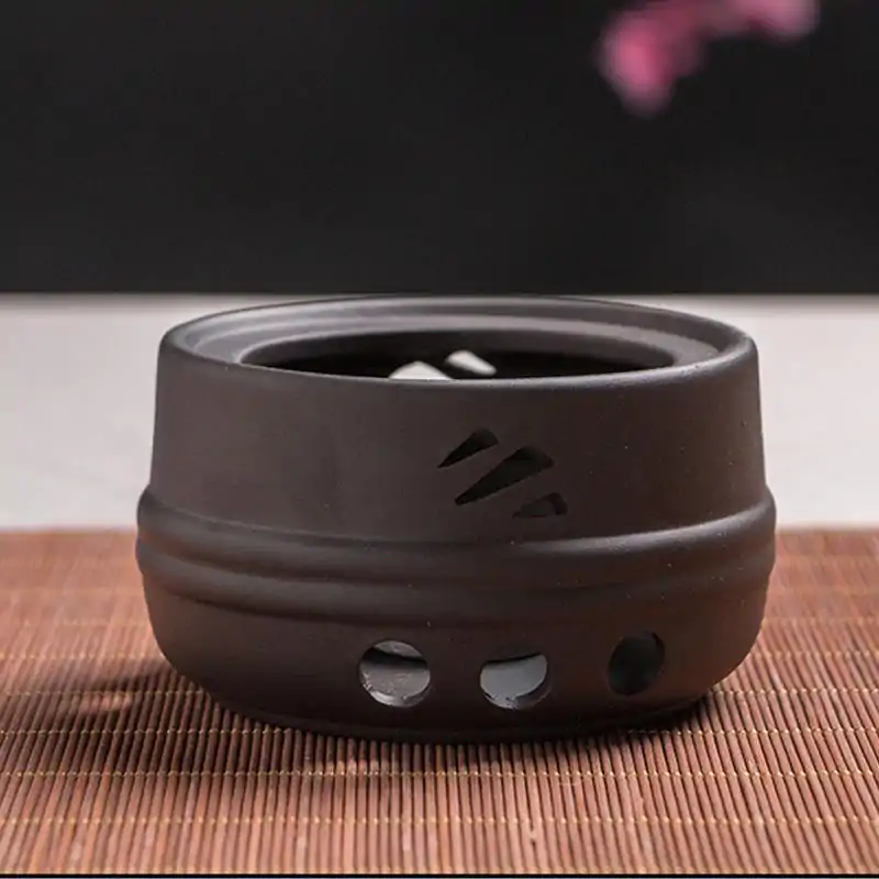 Chauffe Théière <br> Japonais en céramique. | OkO-OKO™ Chauffe Théière en Céramique posé sur une table | OkO-OkO
