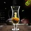 Té e infusión <br> Flor de té que se abre en el agua. | OkO-OKO™ Bonita flor de té en una taza | OkO-OkO