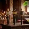Three golden moulin priere tibetain mantras with dark wooden handles resting on a carved antique table in a temple