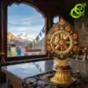 Ornate gold-plated roue dharma doree dharmachakra with turquoise accents and red jewels on a dark engraved background